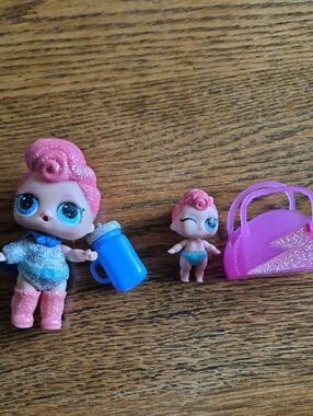 L.O.L. Surprise! Pink Glitter Doll with Blue Accessories